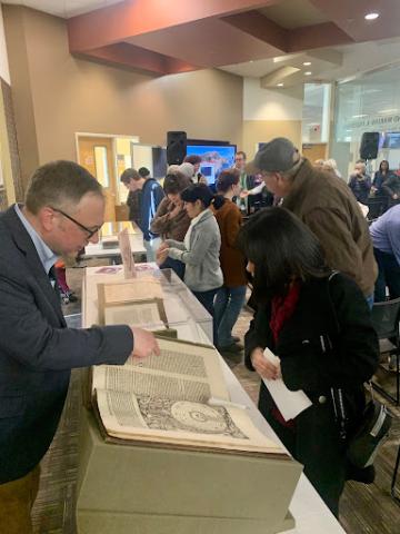 Bill Claspy, Team Leader for Special Collections and University Archives, shares an illustration of the heavens found in KSL’s copy of The Nuremberg Chronicle, 1493.